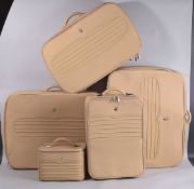 A SUIT OF MASERATI ?? LEATHER LUGGAGE, two suitcases, vanity case, zip-up case and medium case.