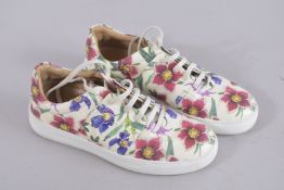 A PAIR OF SALVATORE FERRAGAMO TRAINERS, size 41.5. Signs of wear.