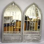 A PAIR OF GREY GARDEN MIRRORS. 4ft 8ins high x 2ft 2ins wide.