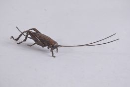 A BRONZE OKIMONO OF A LONGHORN BEETLE.