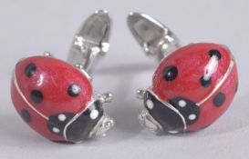 A PAIR OF STERLING SILVER LADYBIRD CUFFLINKS.