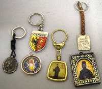 THREE RUSSIAN KEY RINGS, SWISS KEY RING, GREEK COIN and small icon.
