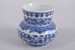 A CHINESE BLUE AND WHITE PORCELAIN VASE, with six-character mark to base. 10.5cm high.