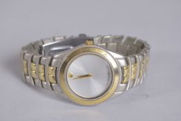 A GENTLEMAN'S MOVADO WRIST WATCH with gilt and white metal strap.
