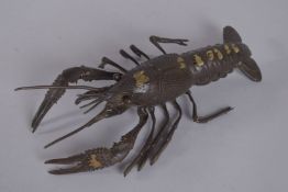 A LARGE JAPANESE ARTICULATED BRONZE GOLD SPLASH LOBSTER. 10ins long.