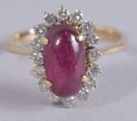 A RUBY AND DIAMOND CLUSTER RING, cabochon (Burmese) non-treated ruby 2.7ct set 0.4ct diamonds in 18k