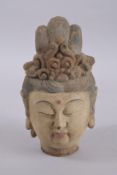 A CHINESE WOODEN GUANYIN HEAD.