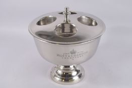 A MOET & CHANDON CIRCULAR FOUR-BOTTLE COOLER. 14ins diameter x 14ins high.