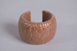 A COOKOO MOMENT VINTAGE CROCODILE SKIN BANGLE. 7cm diameter.