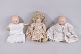 THREE SMALL VICTORIAN DOLLS.