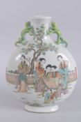 A CHINESE PORCELAIN MOON FLASK painted with figures. 13ins high.