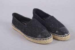 A PAIR OF CHANEL ESPADRILLES SHOES, size 36, in Chanel bag. Signs of wear.