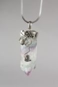 A SILVER AMETHYST CRYSTAL on a chain.