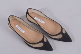 A PAIR OF AQUAZZURA BLACK FLAT SHOES, size 37. Signs of wear. 310.