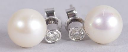 A PAIR OF 18CT GOLD, PEARL AND DIAMOND EAR STUDS.