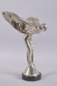 A SILVER PLATE ROLLS ROYCE FIGURE on a circular base. 15ins high.