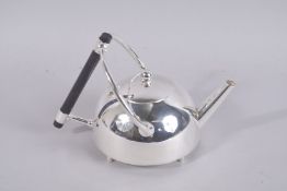 A CHRISTOPHER DRESSER DESIGN CIRCULAR TEAPOT.