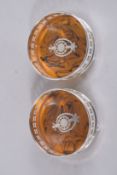 A PAIR OF FAUX TORTOISESHELL AND PLATE CIRCULAR WINE COASTERS. 8ins diameter.