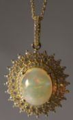 A SILVER GOLD PLATED OPAL AND CZ PENDANT.