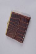 A LANA MARKS CROCODILE FOLDING PURSE. 5ins x 4ins.
