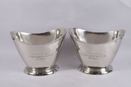 A PAIR OF OVAL CHAMPAGNE WINE COOLERS. 14ins long x 10ins high.