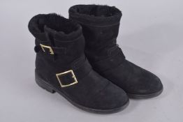 A PAIR OF JIMMY CHOO BLACK ANKLE BOOTS, size 37. Signs of wear.