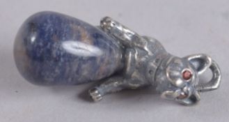 A RUSSIAN LAPIS AND SILVER DOG PENDANT.