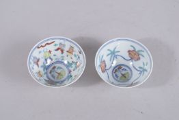 A PAIR OF CHINESE DOUCAI PORCELAIN CUPS. 9cm diameter.
