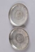 A PAIR OF COIN DISHES. 3.5ins.