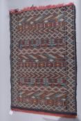 TWO AFRICAN RUGS. 36ins x 26ins and 60ins x 34ins.