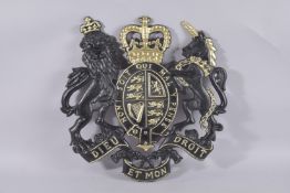 A PAINTED ROYAL COAT OF ARMS. 19ins x 17ins.