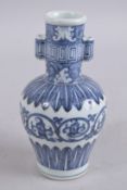 A CHINESE BLUE AND WHITE PORCELAIN VASE. 18cm high.