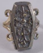 A SILVER COFFIN RING.