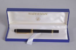 A WATERMAN BLUE FOUNTAIN PEN in box.