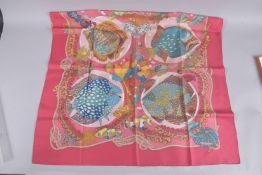 A HERMES SILK SCARF, PINK FISH. 34ins x 36ins, in a Hermes box.