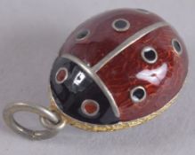 A RUSSIAN SILVER LADYBIRD PENDANT.