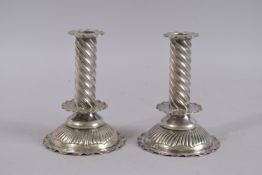 A PAIR OF PLATED DUTCH STYLE CANDLESTICKS. 6ins high.