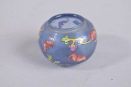 A PEKING GLASS BIRD FEEDER.