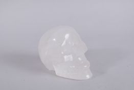 A LARGE CARVED ROCK CRYSTAL SKULL. 5.5ins.