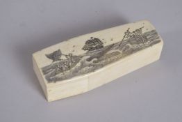 A BONE SCRIMSHAW COFFIN AND SKELETON 4.5ins long.