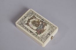 A BONE ENGRAVED FOLDING COMPASS. 4.75ins x 2.25ins.