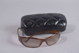 A PAIR OF CHANEL GLASSES 6004-B, in a black cushion padded case. 6ins high.