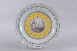 A CONTINENTAL DELFT COLUMN CIRCULAR CHARGER. 14ins diameter.