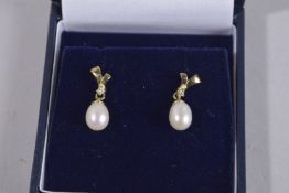 A PAIR OF 9CT GOLD, PEARL AND DIAMOND DROP EARRINGS.