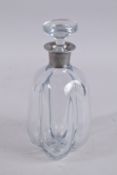 A SILVER TOP SWEDISH GLASS DECANTER AND STOPPER.