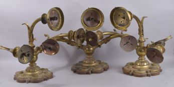 AN IMPRESSIVE SET OF THREE TRIPLE LIGHT WALL LIGHTS, PROBABLY GOTHIC.