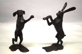 A GOOD PAIR OF BRONZE BOXING HARES. 2ft 9ins high.
