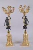 A GOOD PAIR OF THOMAS HOPE FIVE-LIGHT CANDELABRA with bronze classical female figure, supported on