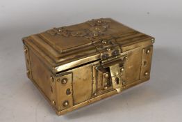 A GOOD BRASS CASKET with lock. 7ins high.
