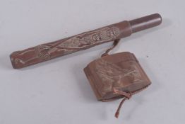 A JAPANESE HARDWOOD INRO AND PIPE CLEANER.